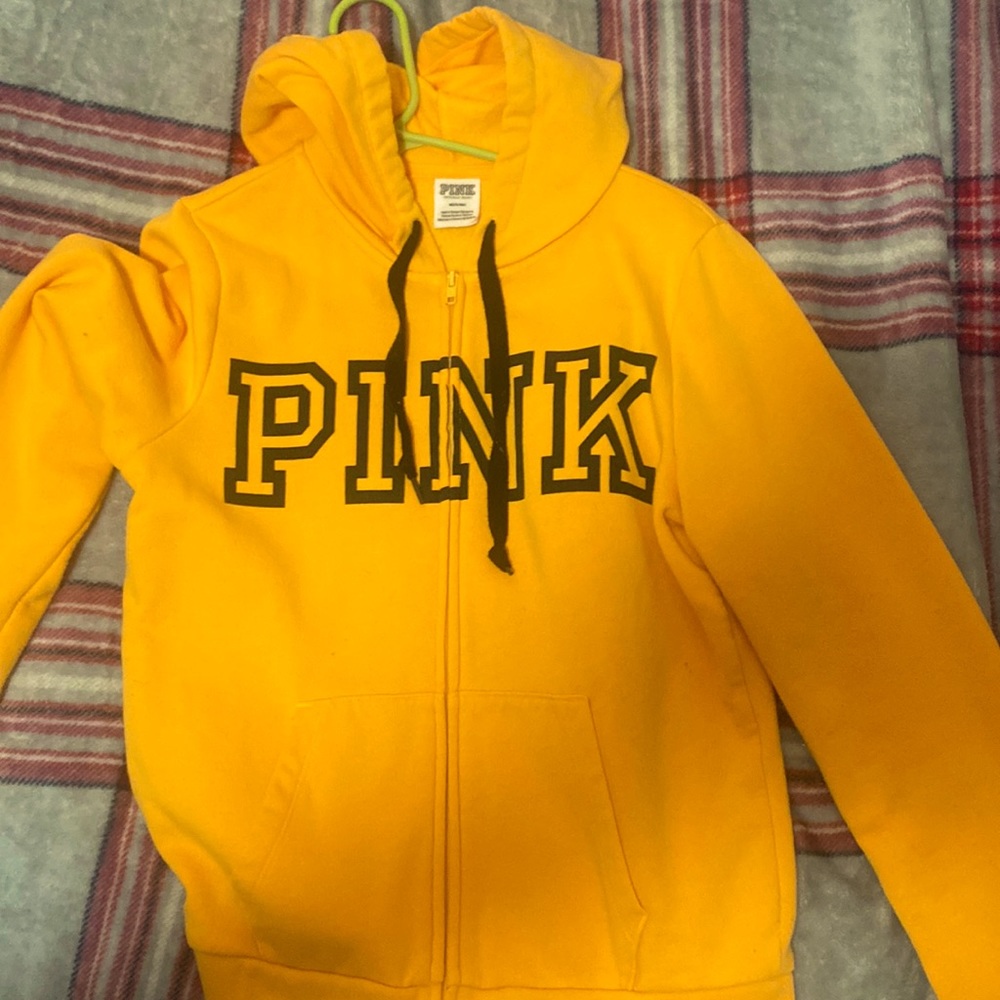 Like new!! Pink zip up hoodie.